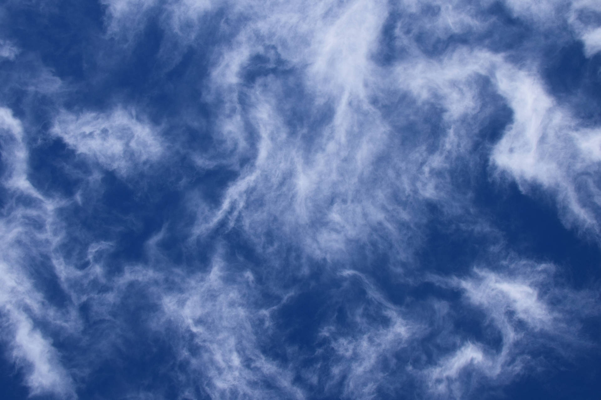 Cool Cirrus Clouds In Blue Skies Wallpaper