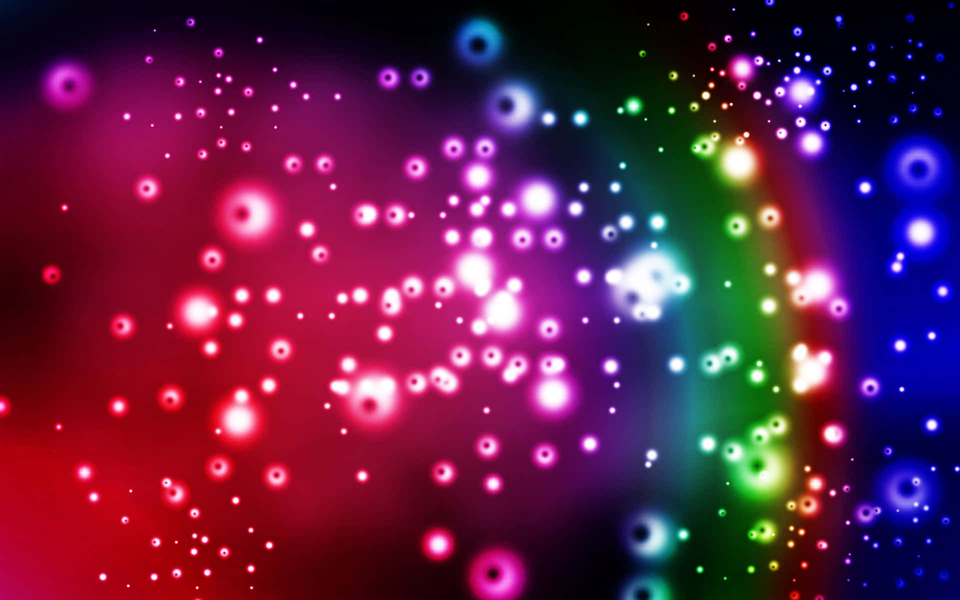 Colorful Lights And Dots On A Black Background