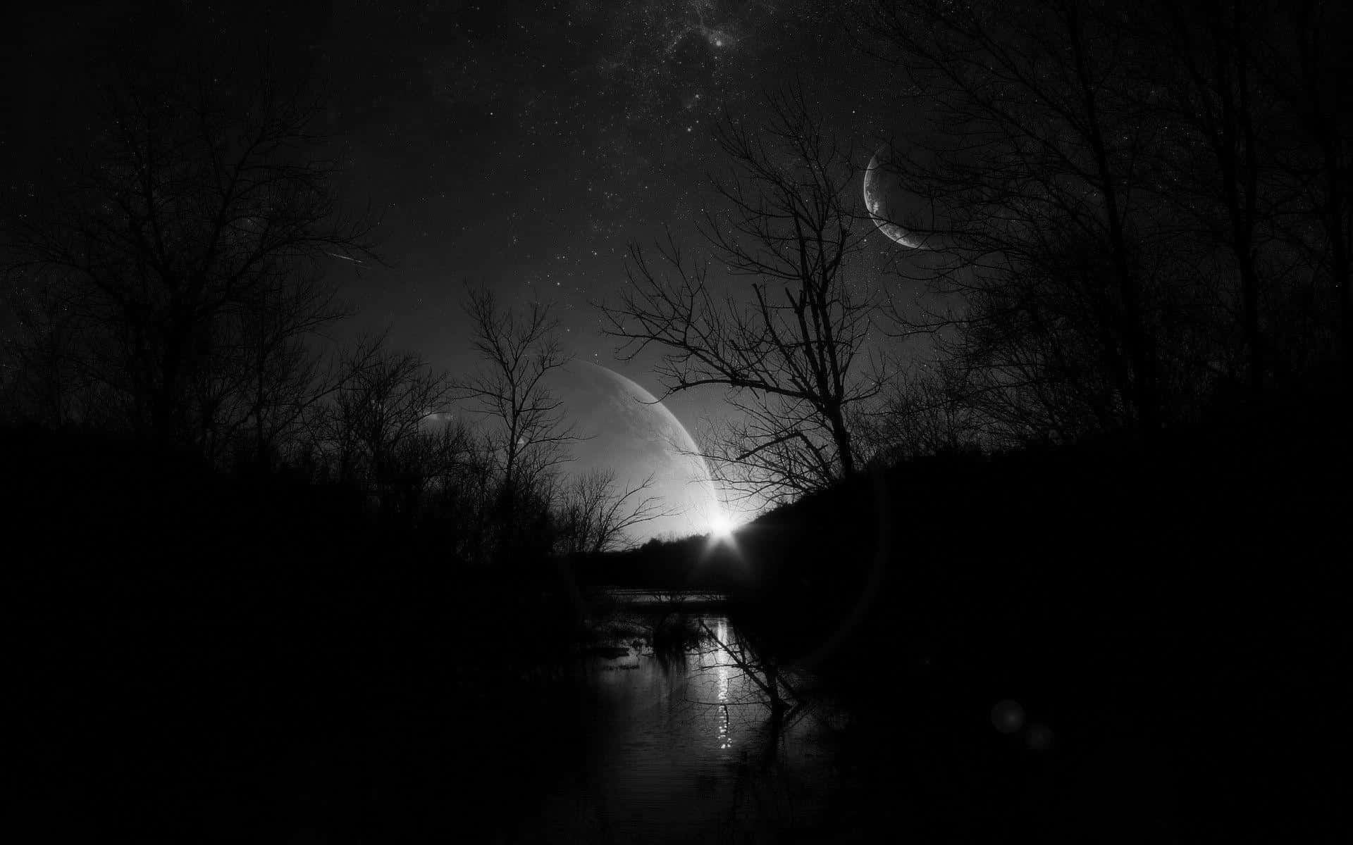 A Black And White Photo Of The Moon And Stars Wallpaper