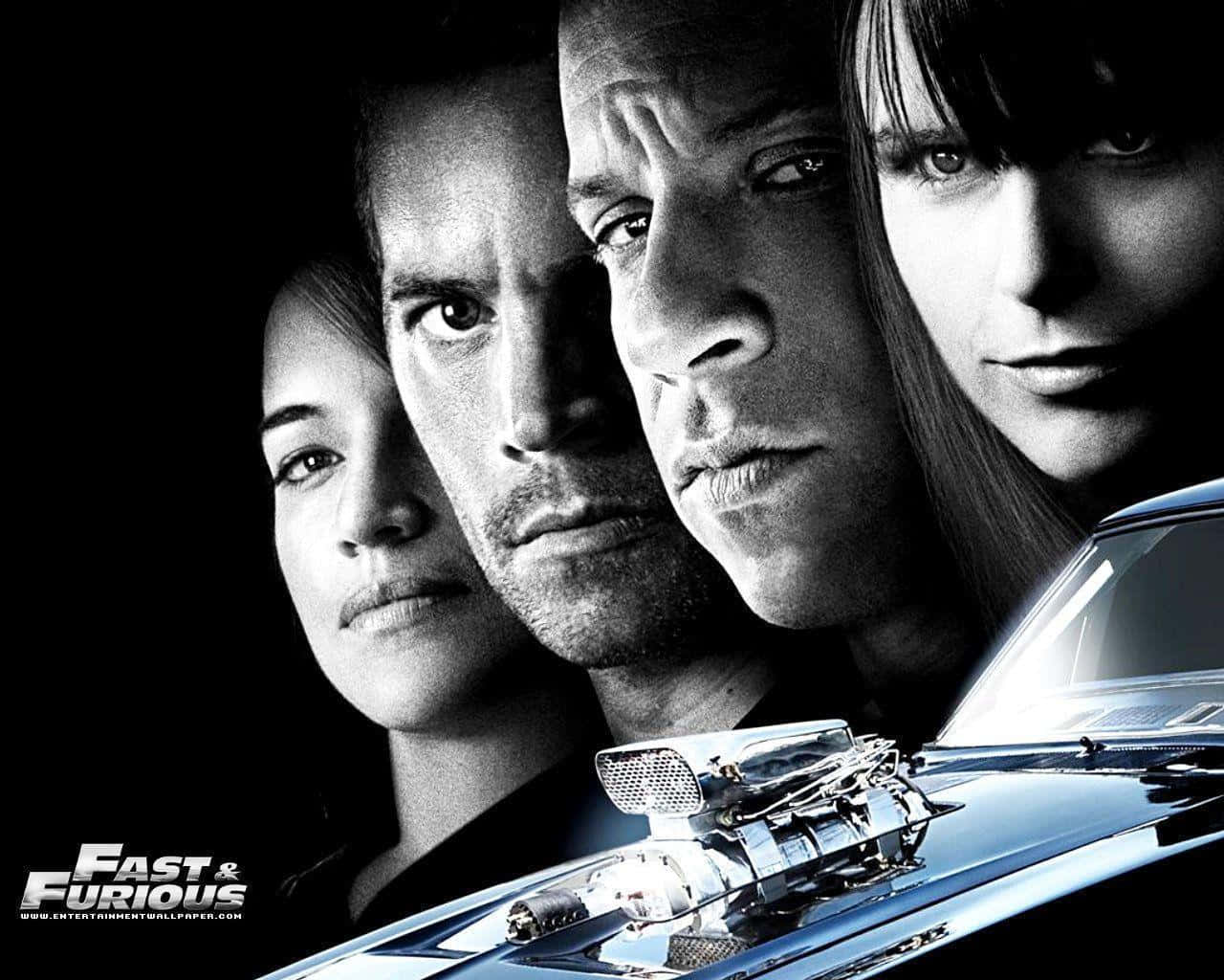 Feel the adrenalin with the Cool Fast And Furious cast Wallpaper