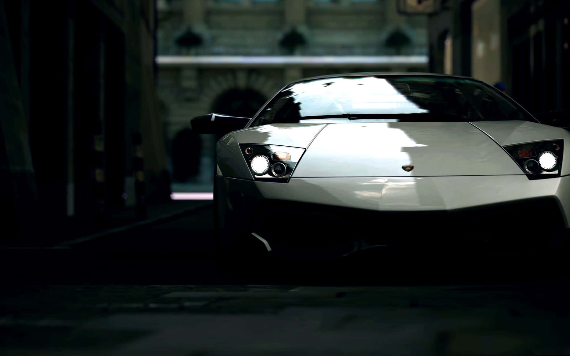 Levende og stilfulde Ferrari biler konkurrerer over din skærm. Wallpaper