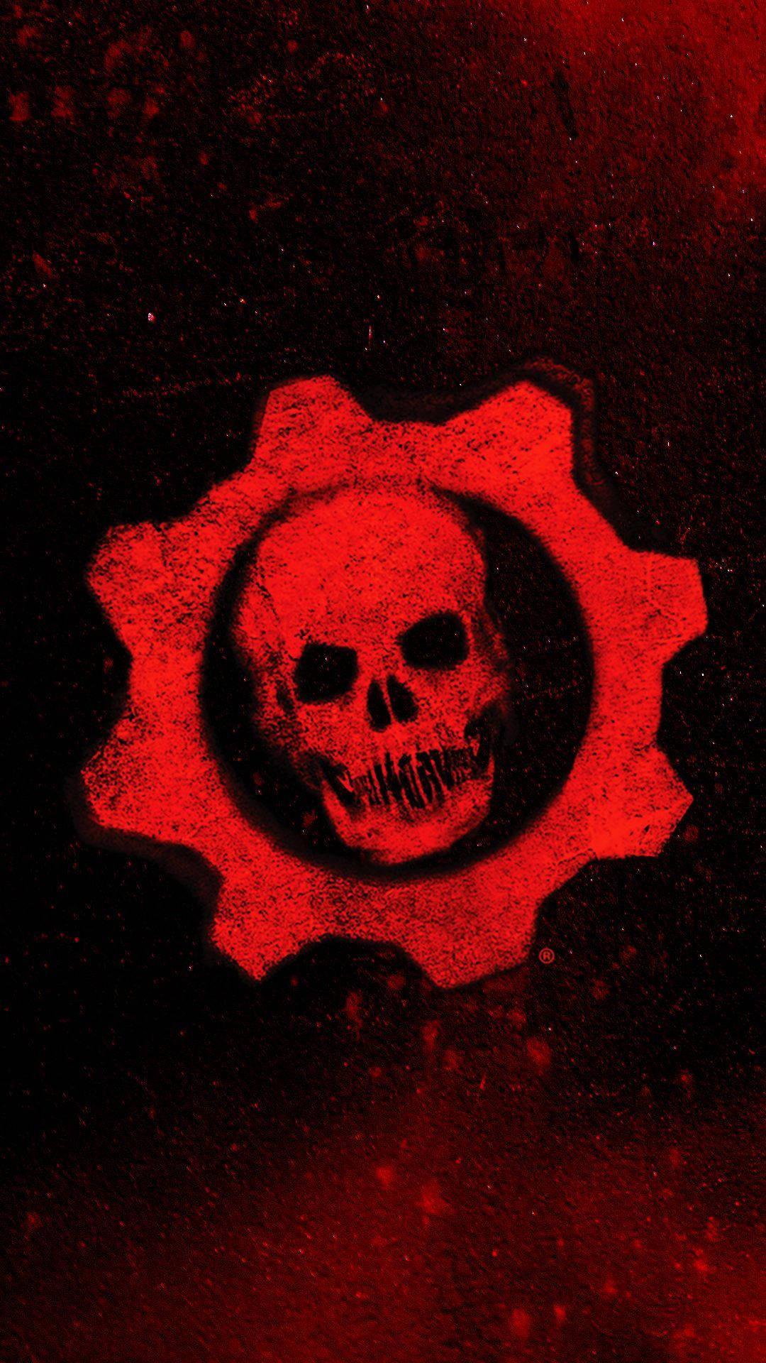 A Gear wielding a massive chain gun blasts through the battlefield in "Gears of War 5" Wallpaper