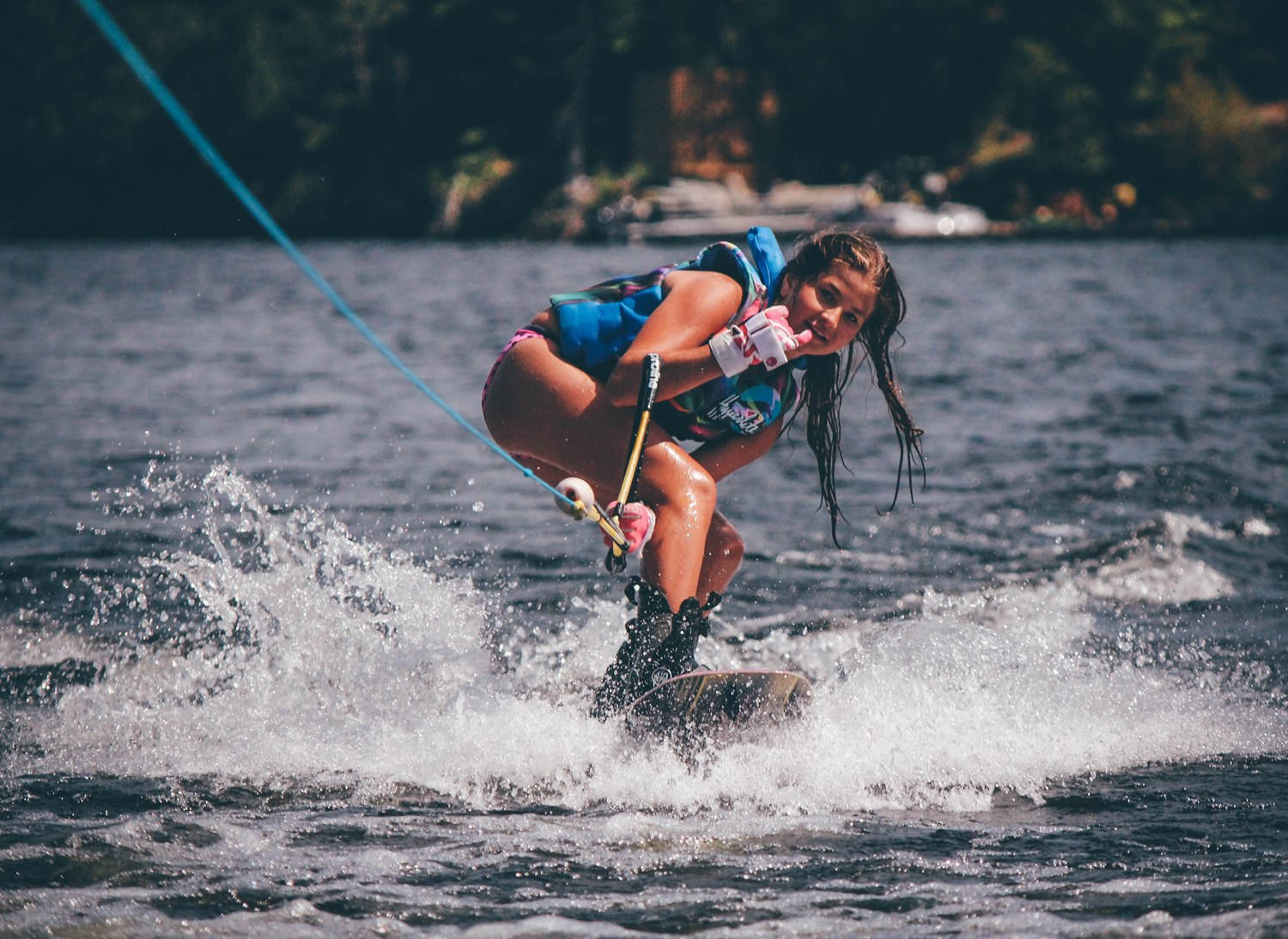 Cool Girl Ducked Wakeboarding Stance Wallpaper