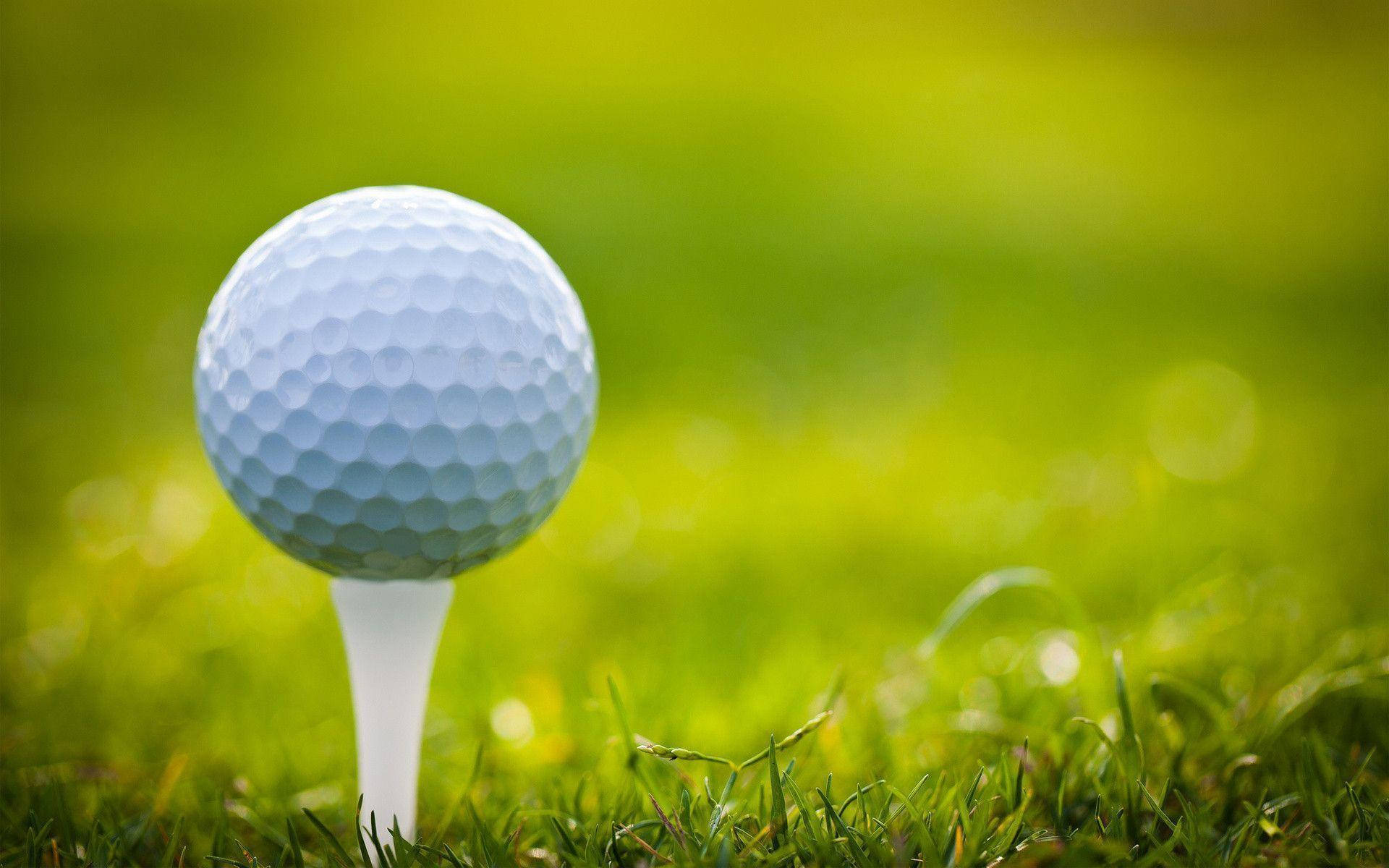 Cool Golf Ball And Tee Green Aesthetic Wallpaper