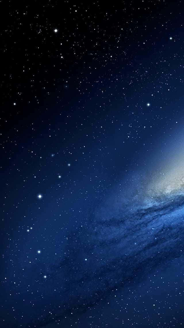 An Apple Iphone Is Shown In The Sky Wallpaper