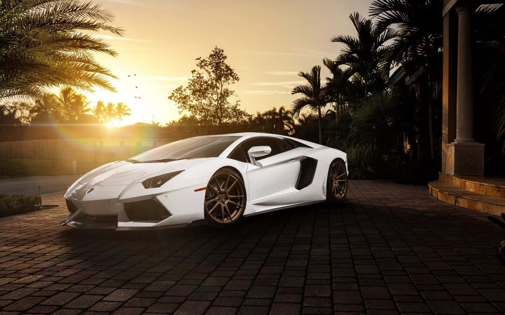 Cool White Lamborghini Aventador At Sunset Wallpaper