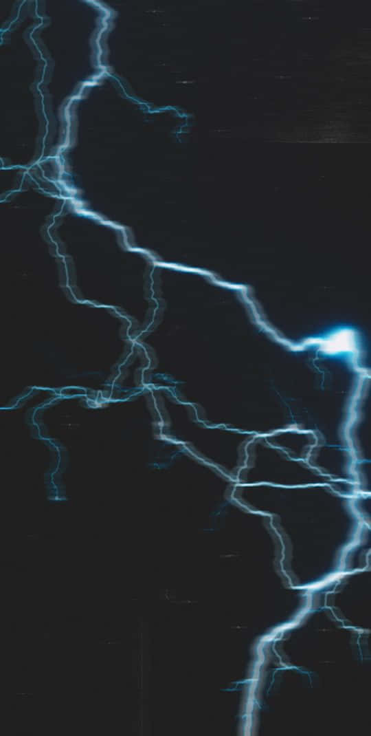 Capture The Enchanting Beauty Of A Lightning Storm Wallpaper