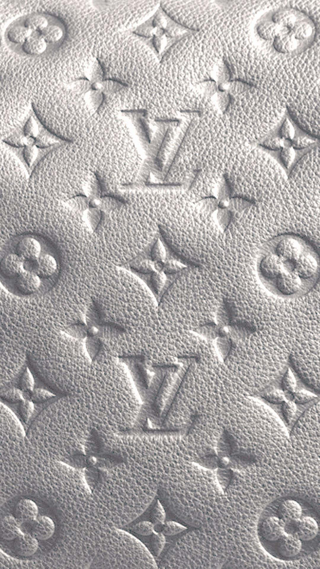 Gören Modig Uttalande I Din Garderob Med Klassiska Louis Vuitton Wallpaper