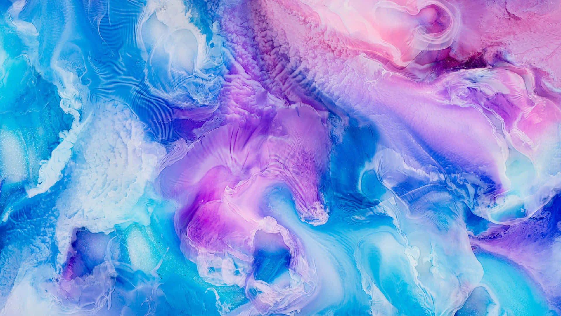 A Close Up Of A Blue And Purple Paint Wallpaper