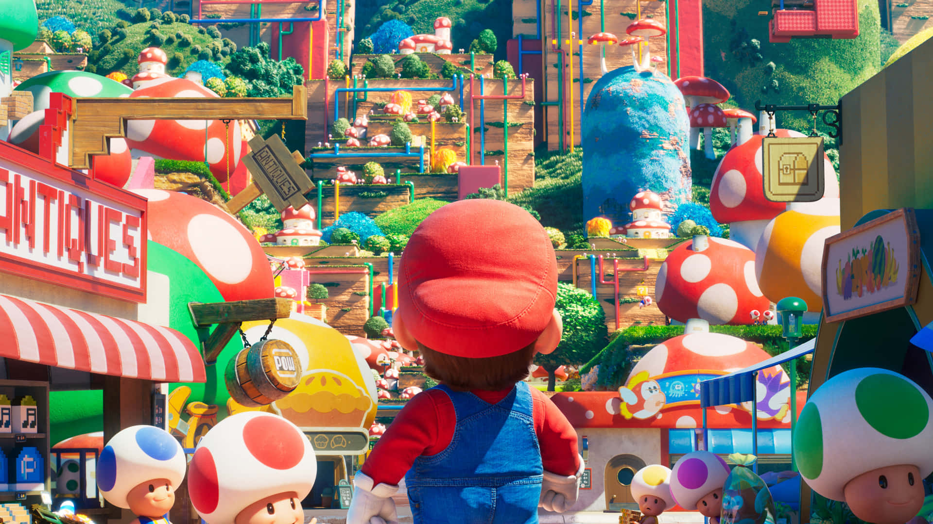 Cool Mario shows off his agility as he collects coins in the Mushroom Kingdom Wallpaper