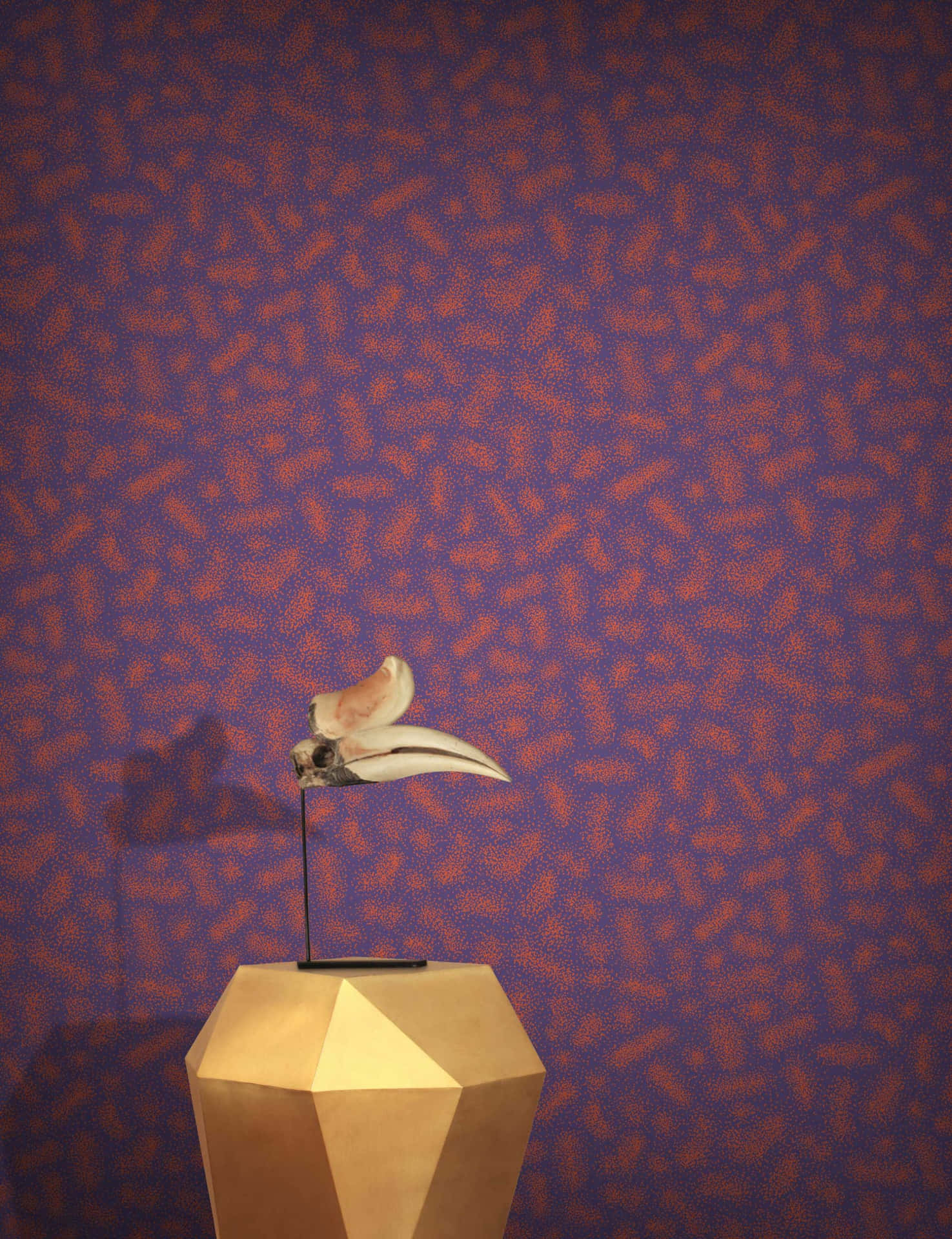 A Gold Bird Sitting On A Pedestal In Front Of A Purple Wall Wallpaper