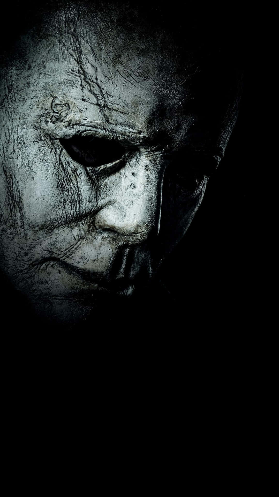 Michael Myers Preparing To Scare The Halloween Crowd Wallpaper
