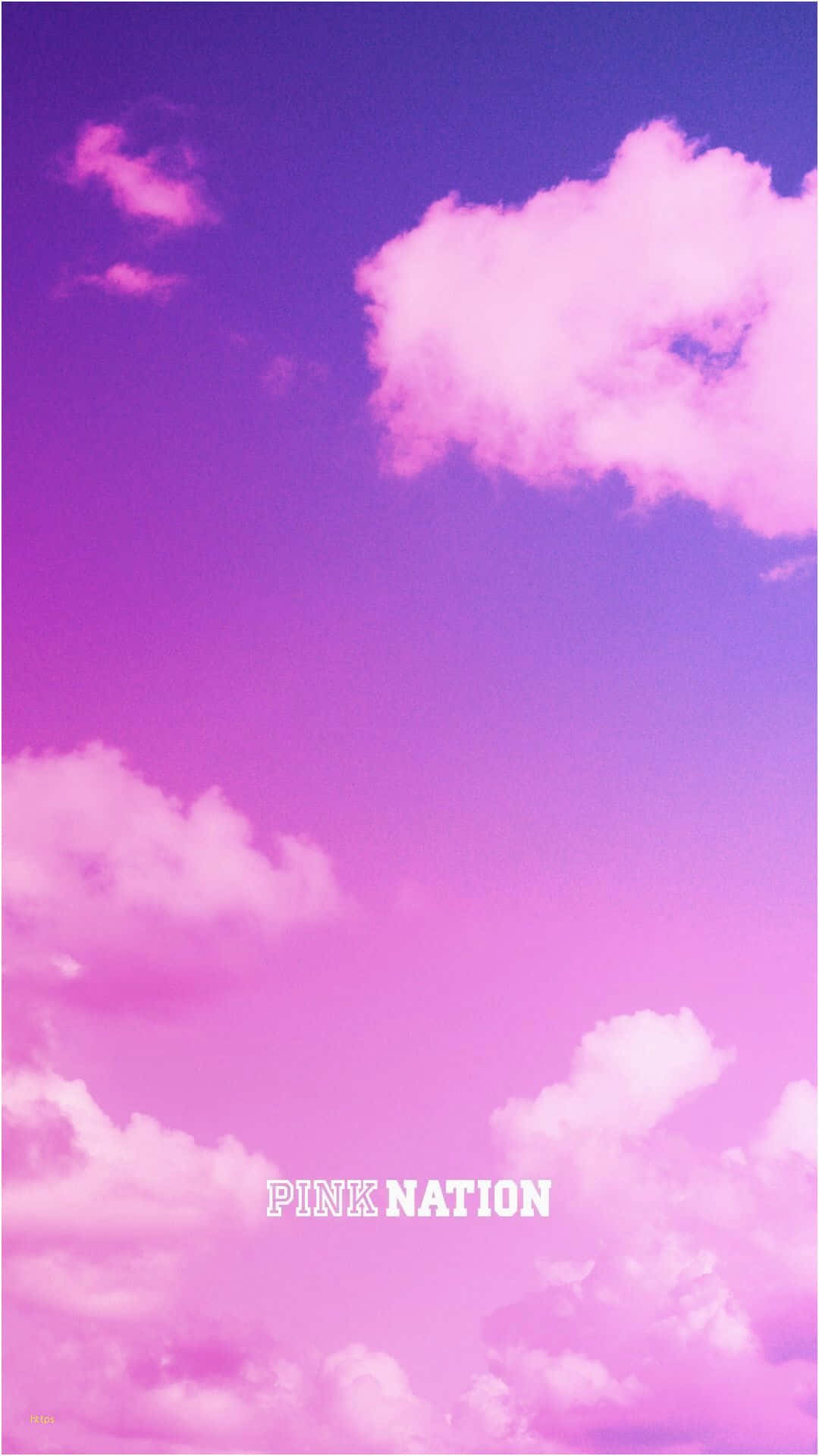 A Pink Sky With Clouds And A Purple Sky
