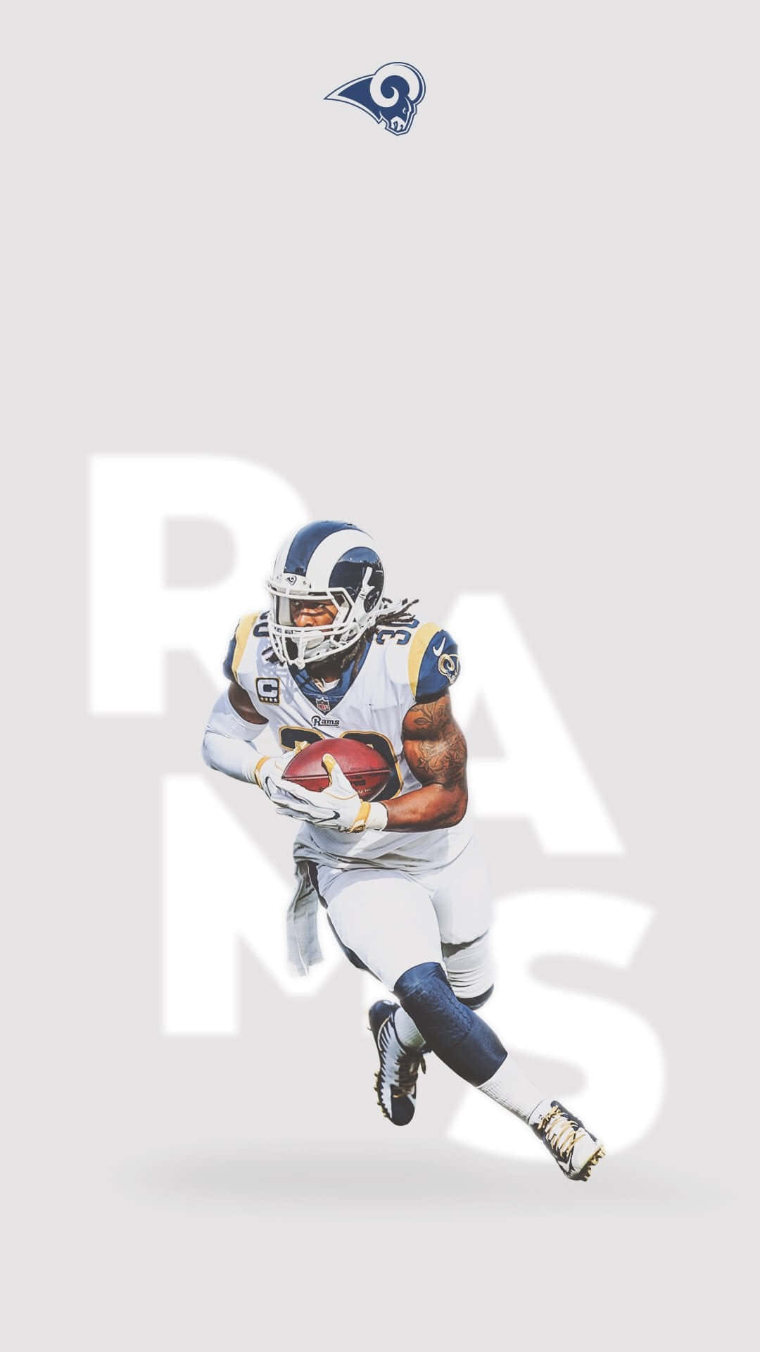 A Rams Player Running With The Ball Wallpaper