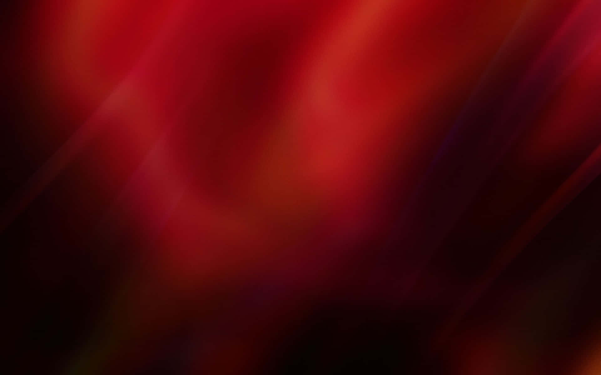 A Red Abstract Background With A Blurred Background