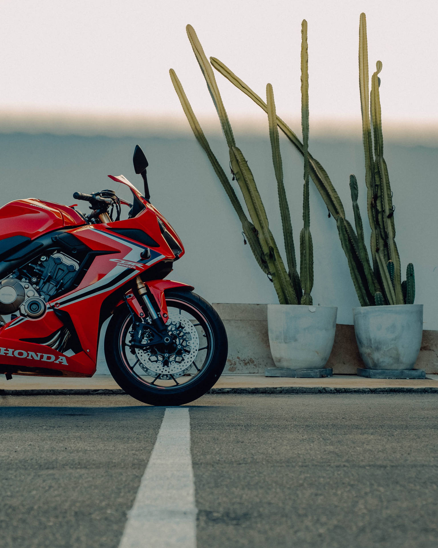 Sleek and Stylish - Honda's Red Motorcycle Wallpaper