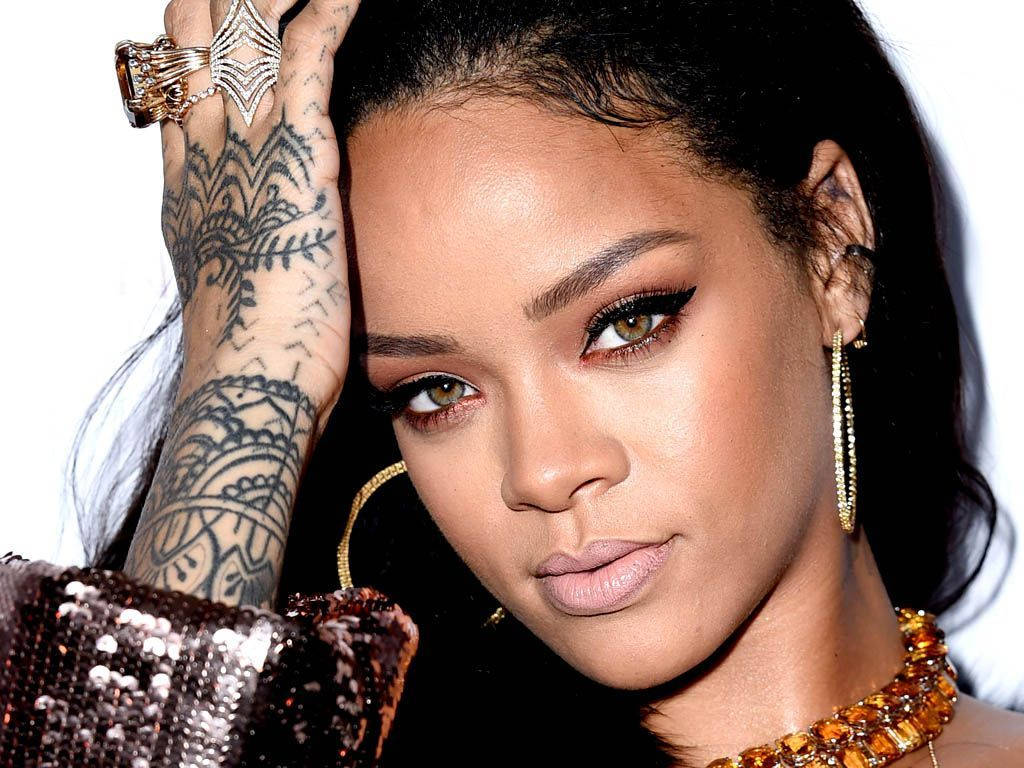 Cool Rihanna With Tattoo Background