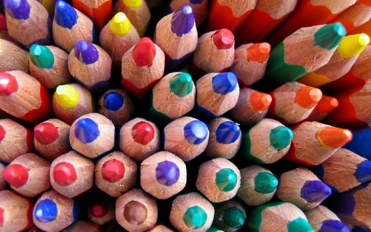 A Close Up Of Many Colored Pencils Wallpaper