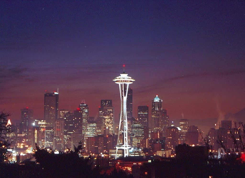 Kølig Seattle City Of Washington State Skyline Om Natten. Wallpaper