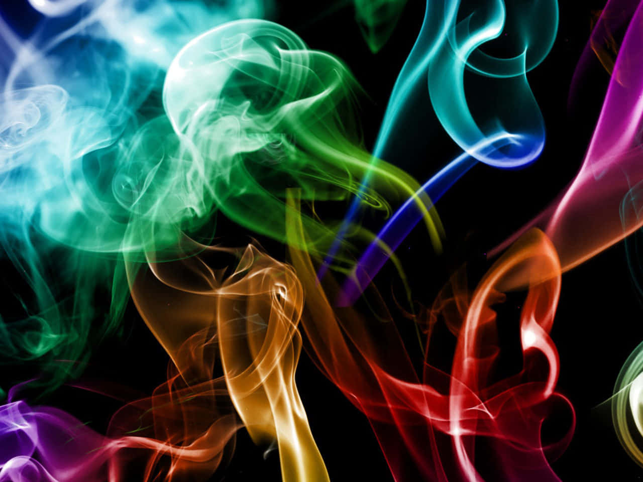 Colorful Smoke On A Black Background Wallpaper