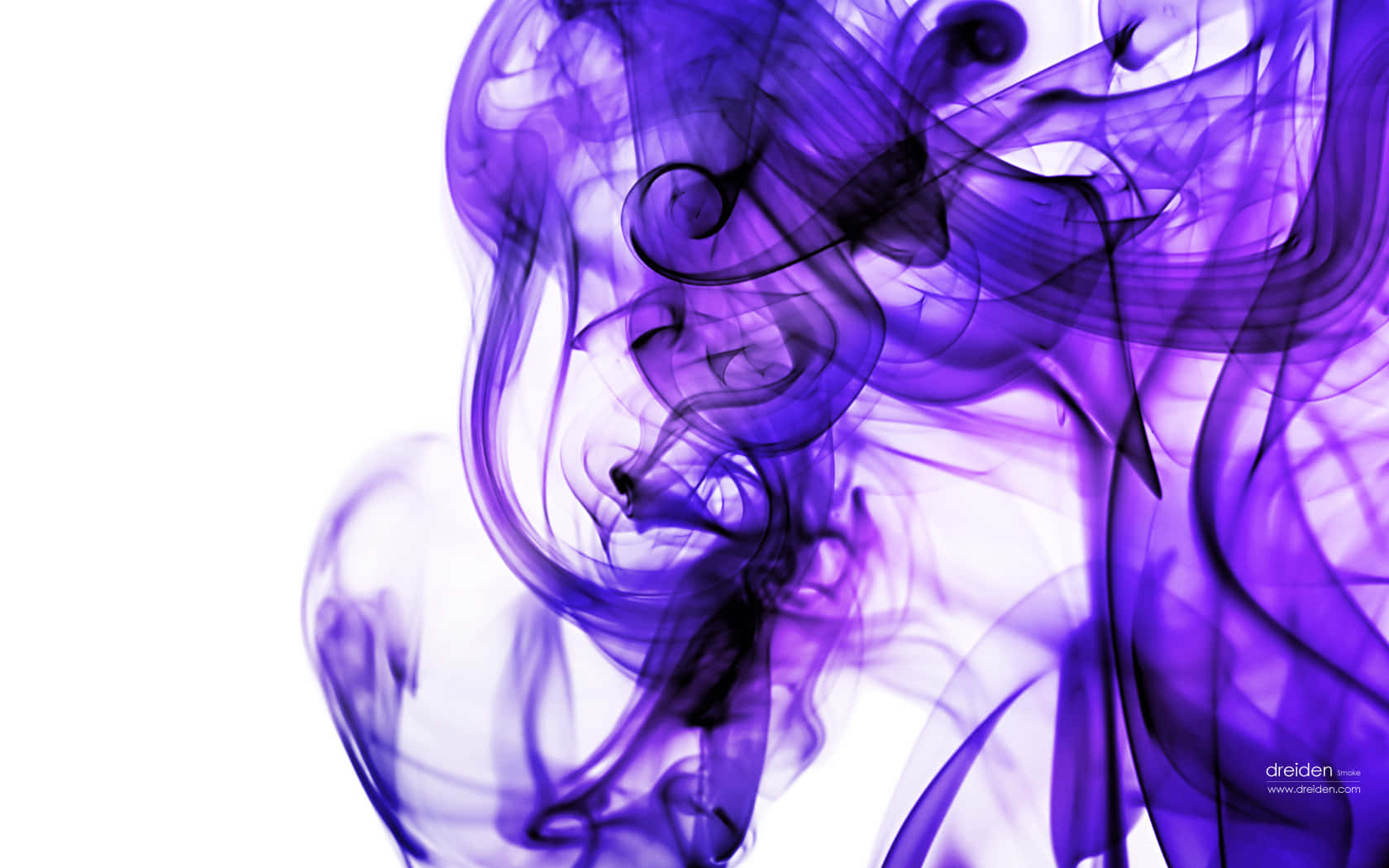 Image  Brightly Colored Smoke in a Dark Setting Wallpaper