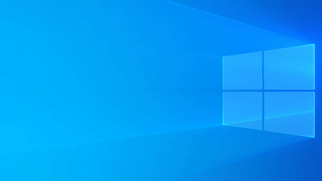 Windows 10 Logo On A Blue Background Wallpaper