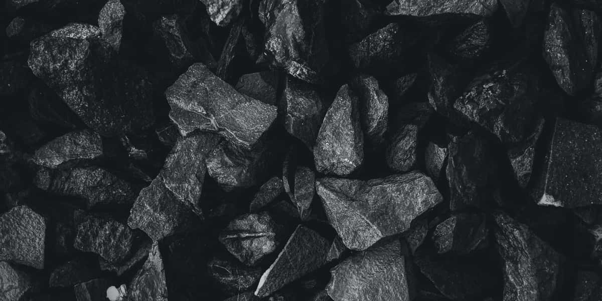Black And White Photo Of A Pile Of Rocks Wallpaper