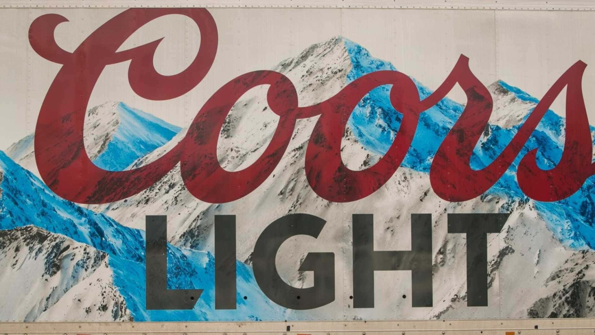 A Large Poster With The Words Coors Light On It Wallpaper