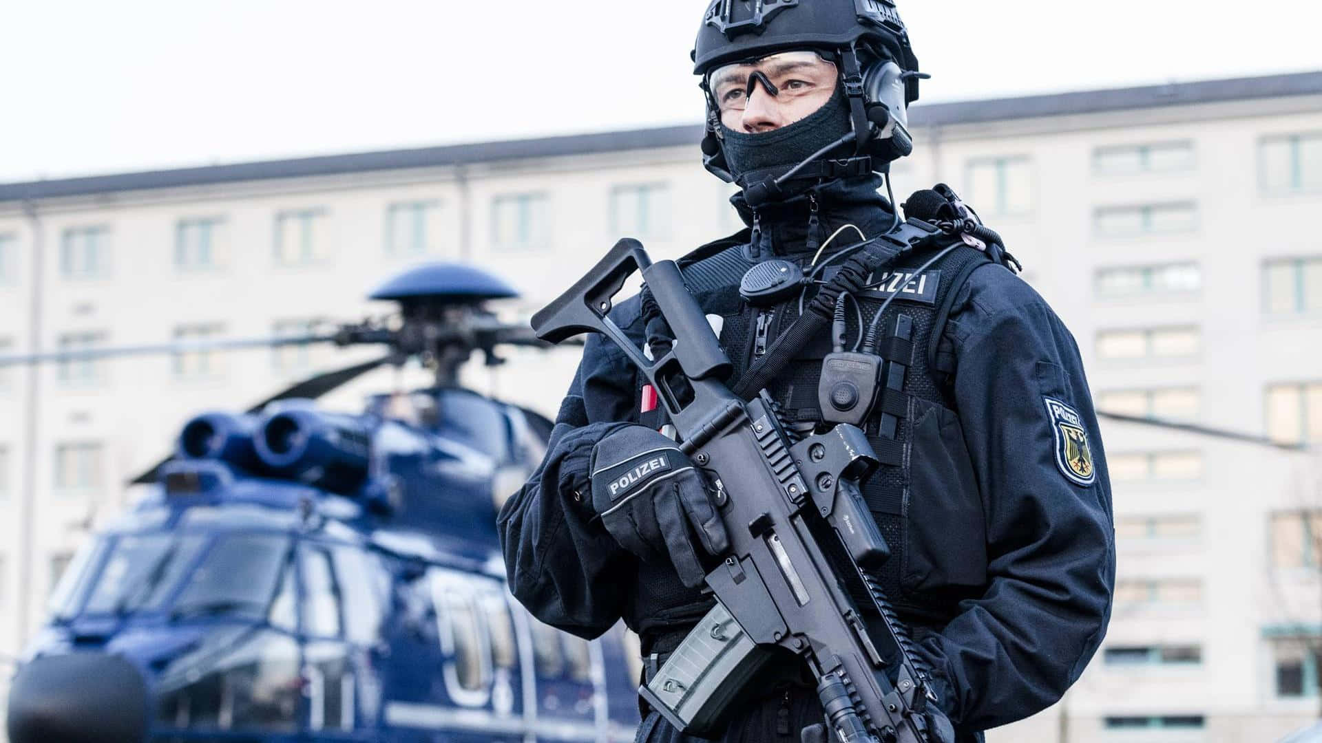 SWAT Cop Officer With Helicopter In Germany Wallpaper