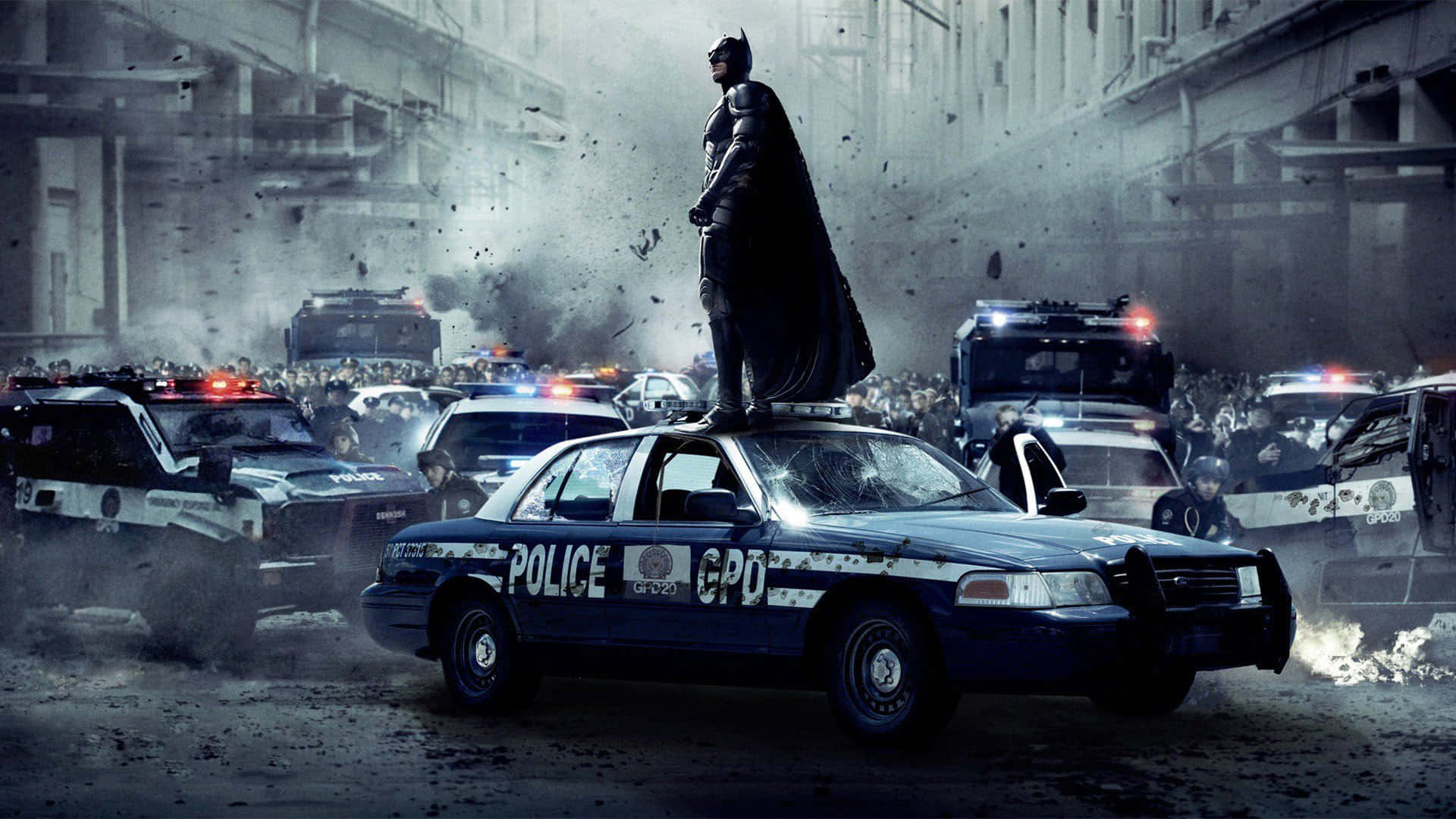 Batman On Top Of Cop Vehicle Wallpaper
