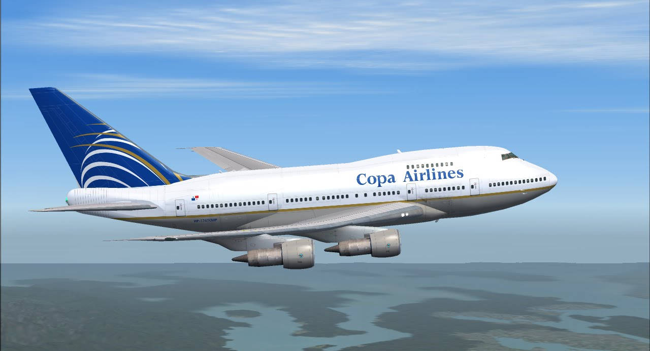 Copaairlines Över Öarna. (this Sentence Can Be Used As A Caption For A Wallpaper Featuring Copa Airlines Flying Above A Group Of Islands.) Wallpaper