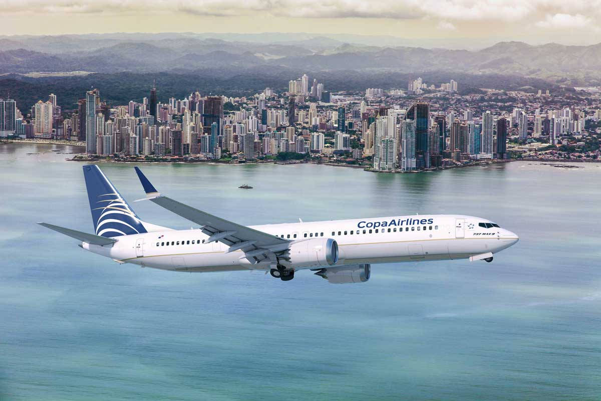Copa Airlines Plane With City Buildings Wallpaper