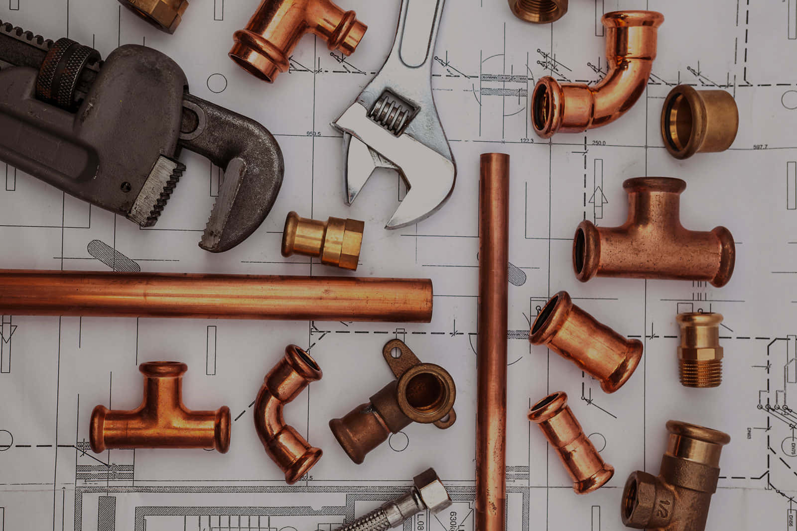 Copper Plumbing Tools And Fittings On Plan Wallpaper