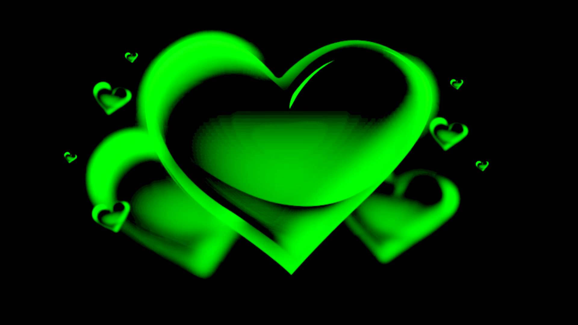 Green Heart Wallpaper — A glowing neon green heart with smaller hearts floating around it against a black background.