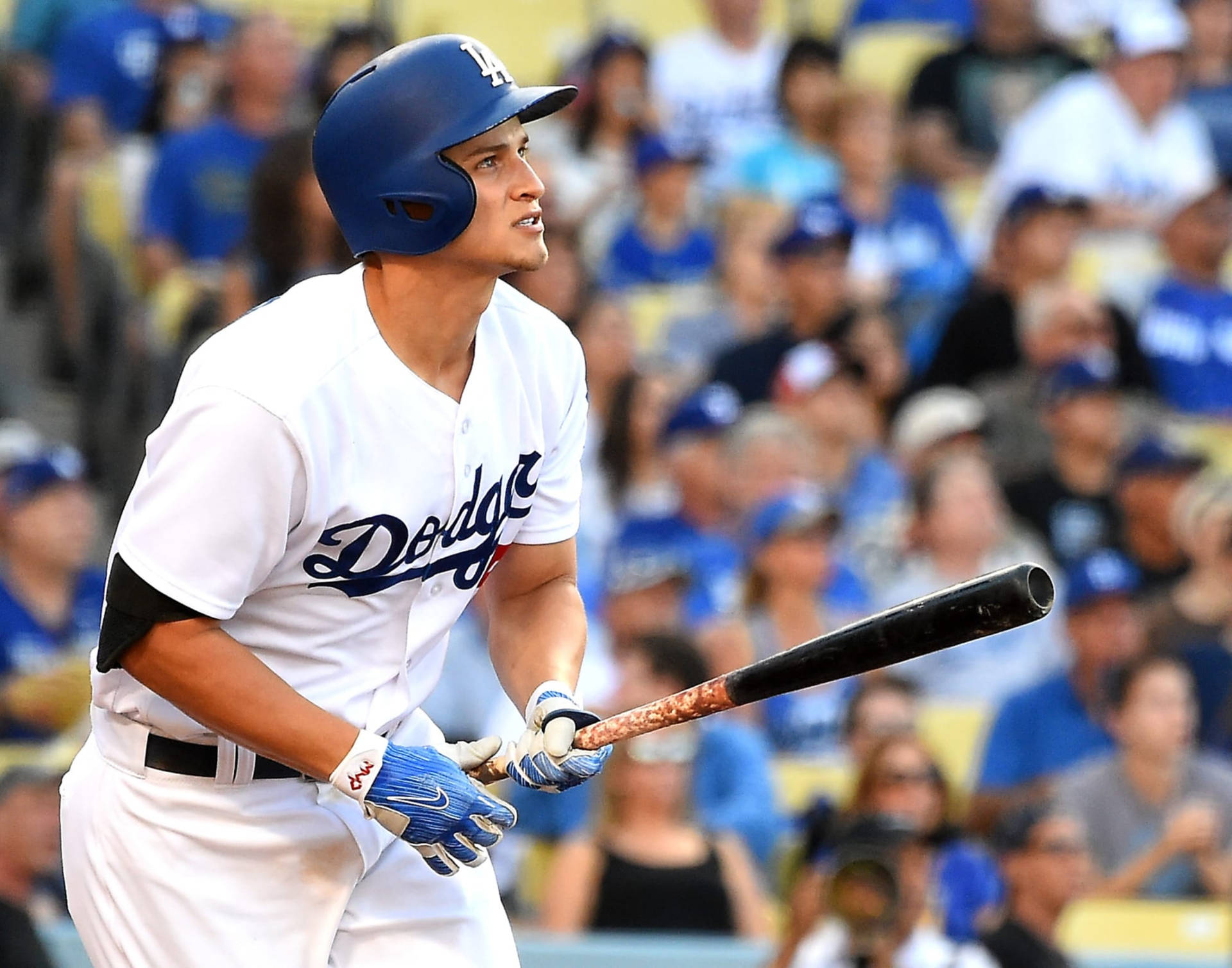 Corey Seager Holding Bat In Front Of Fans Wallpaper