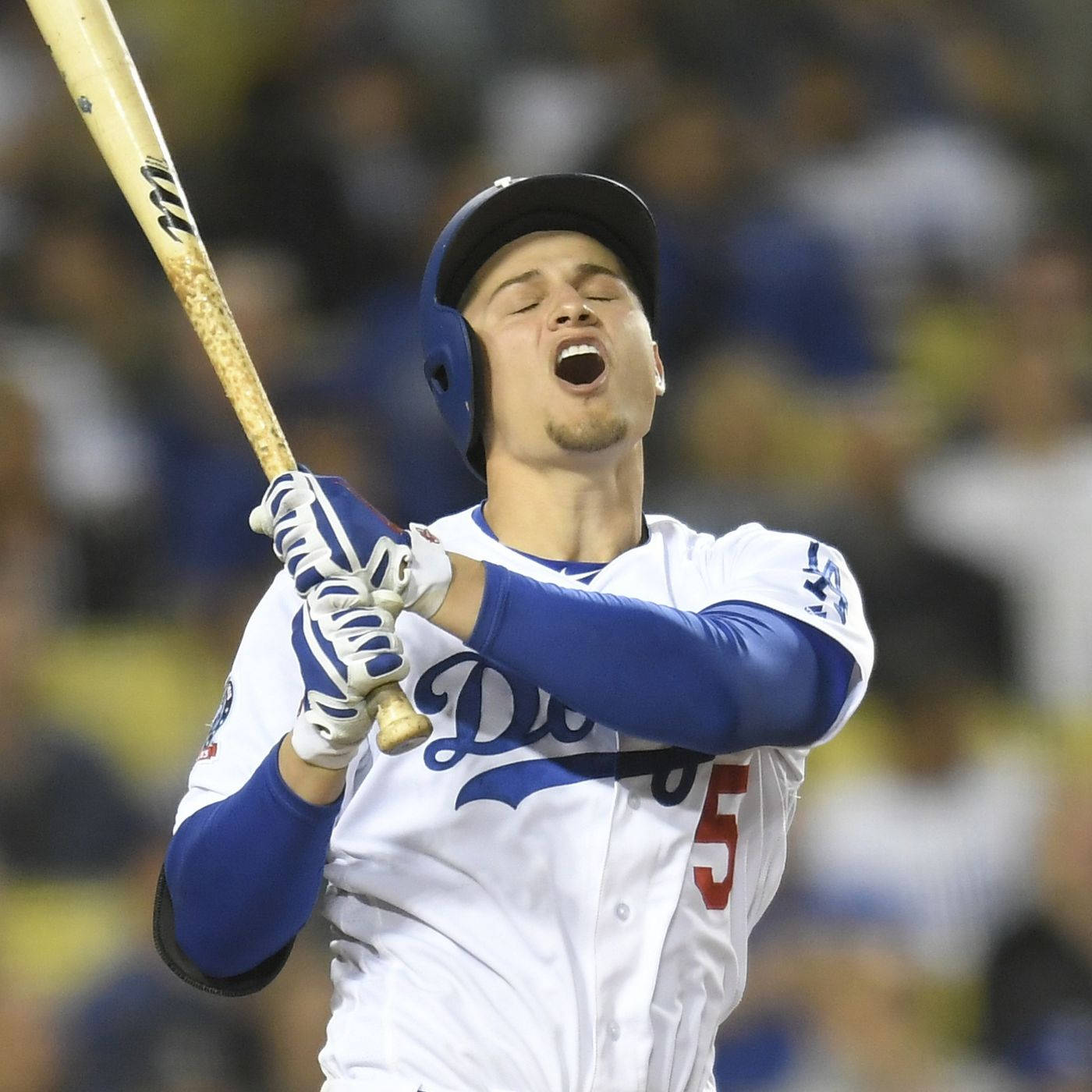 Corey Seager Holding Bat Open Mouth And Eyes Closed Wallpaper