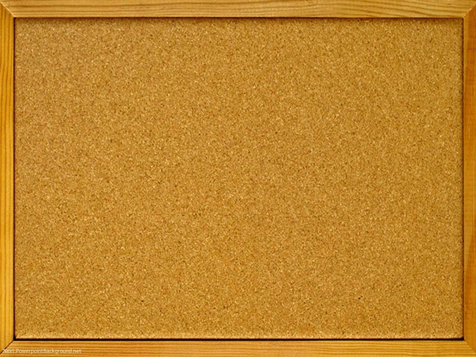 A Wooden Frame With A Cork Board