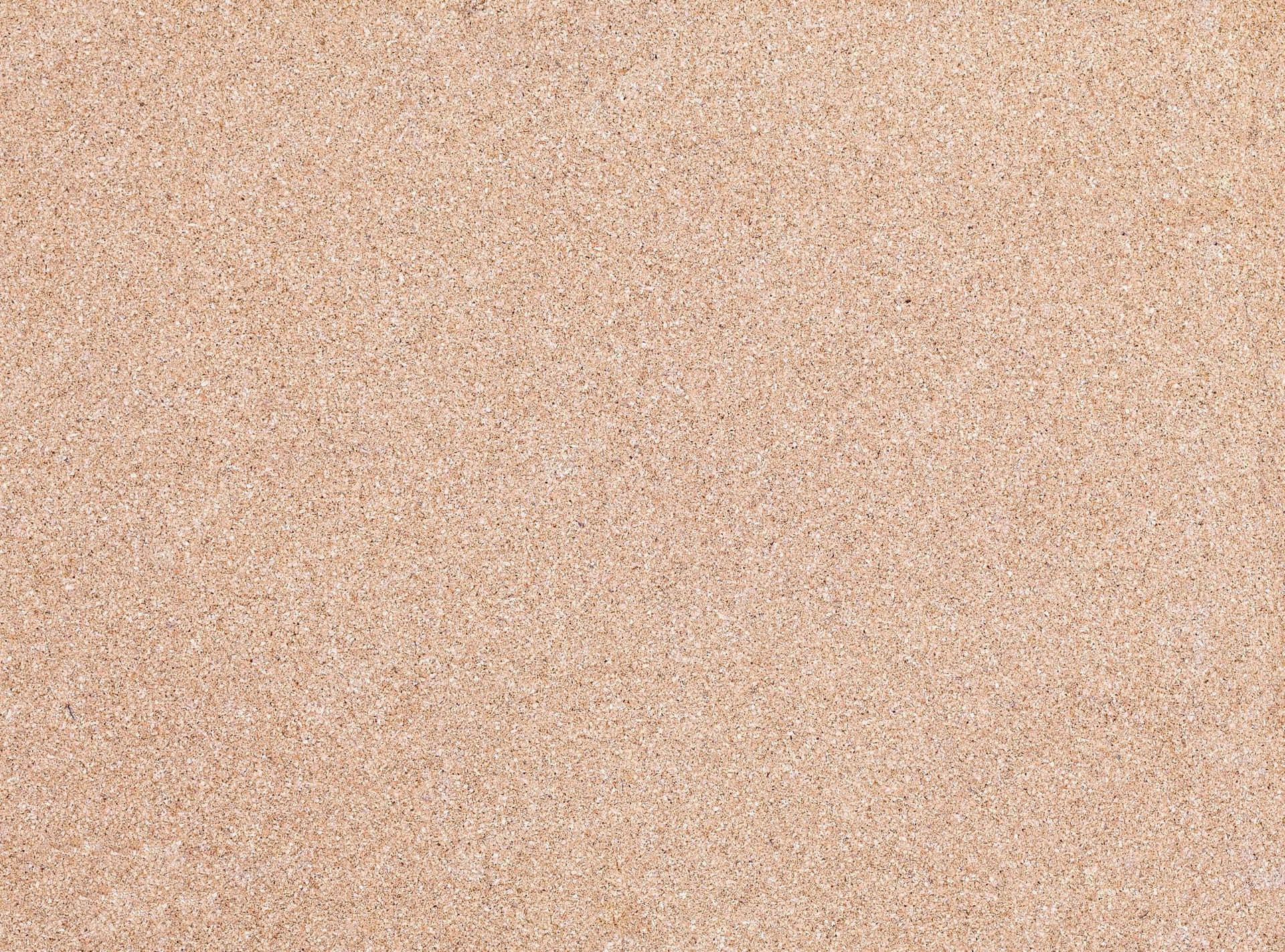 A Close Up Of A Beige Sand