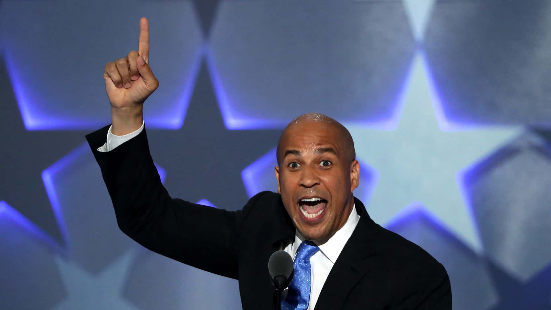 Cory Booker Energetically Pointing Upwards Wallpaper