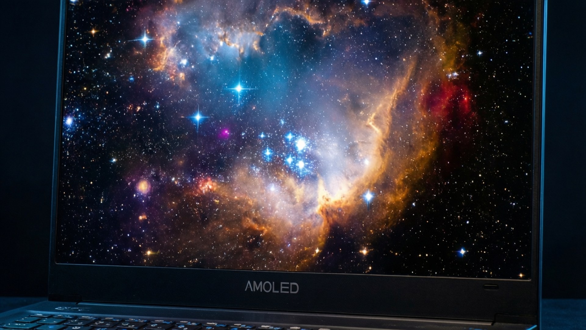 A macro close-up of an AMOLED laptop screen showing a cosmic nebula with deep space HDR colors.