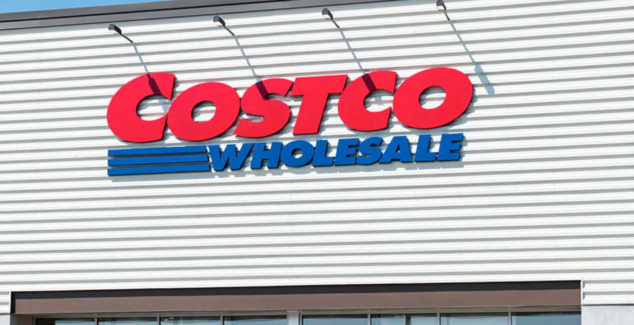 Costco Wholesale Is A Large Store With A Blue Sign