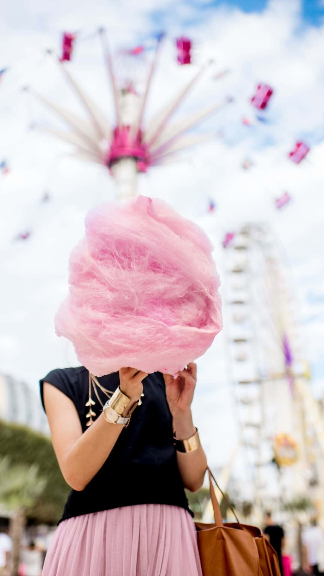 Delicious and Fluffy Cotton Candy on a Stick Wallpaper
