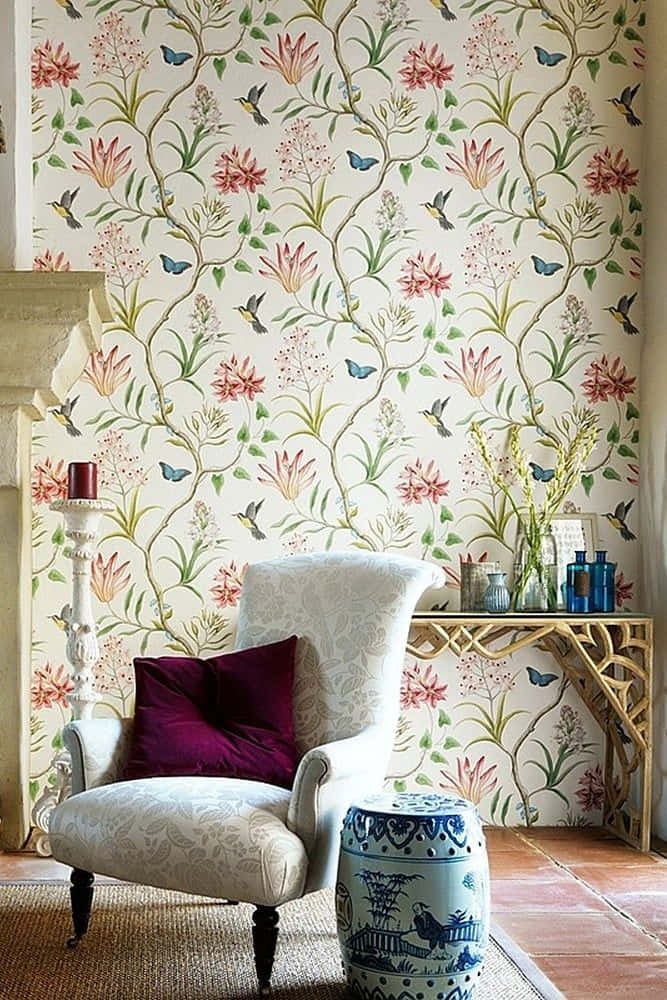 Couch Against A Wall With Subtle Design Of Flowers Wallpaper