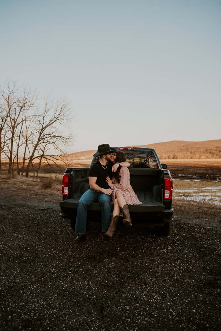 Country Couple Sitting In Car Picture