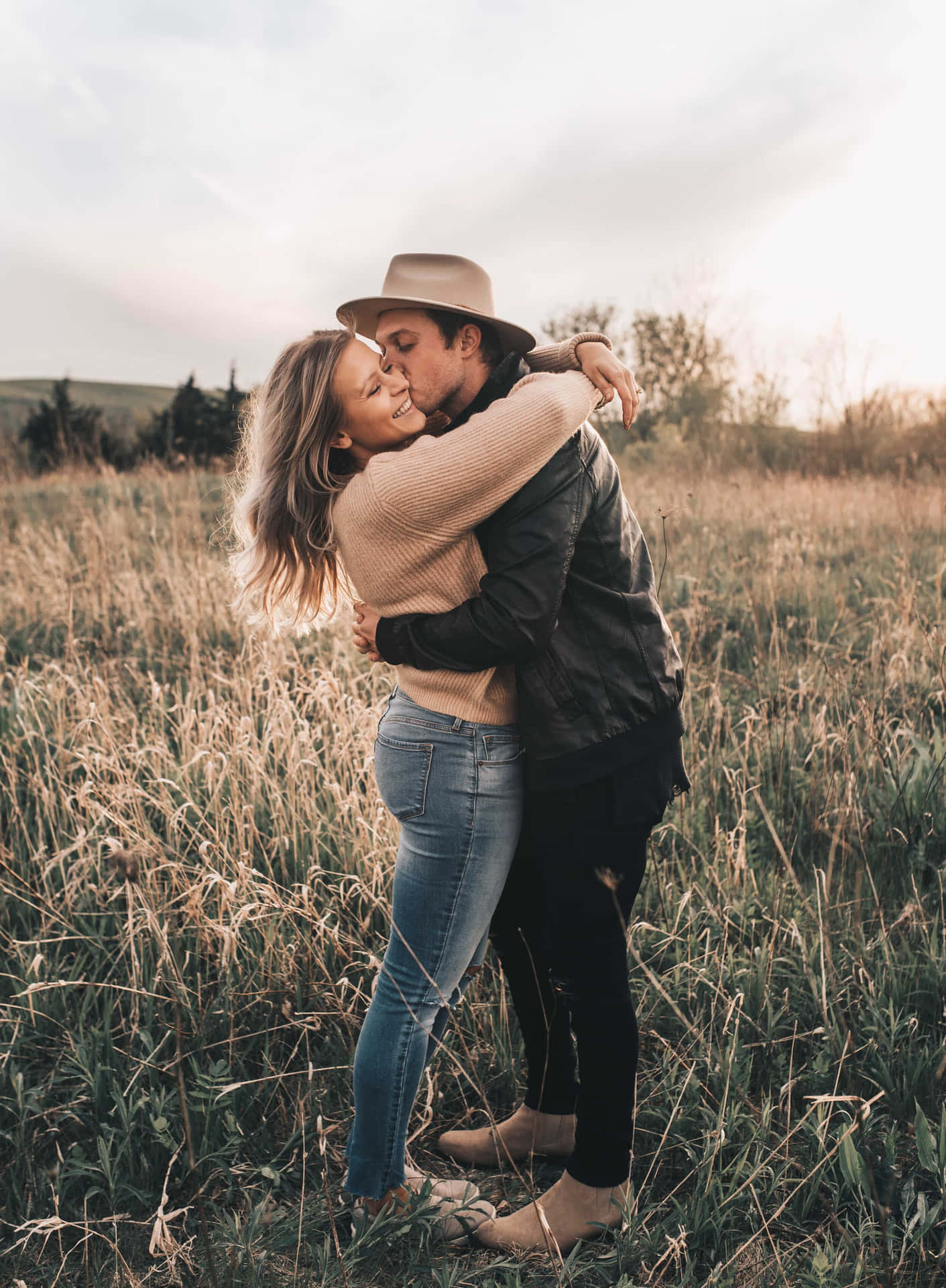 Kissing And Hugging Country Couple Picture