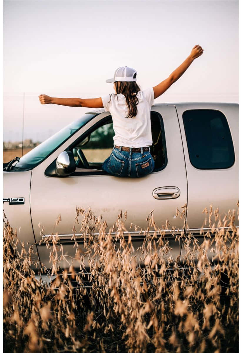 Country Girl Celebrating Freedom Truck Field Wallpaper