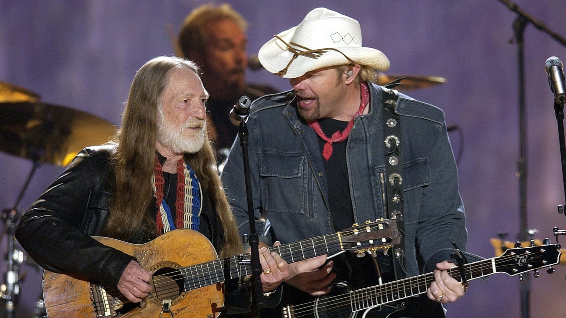 Country_ Music_ Legends_ Performing_ On_ Stage Wallpaper