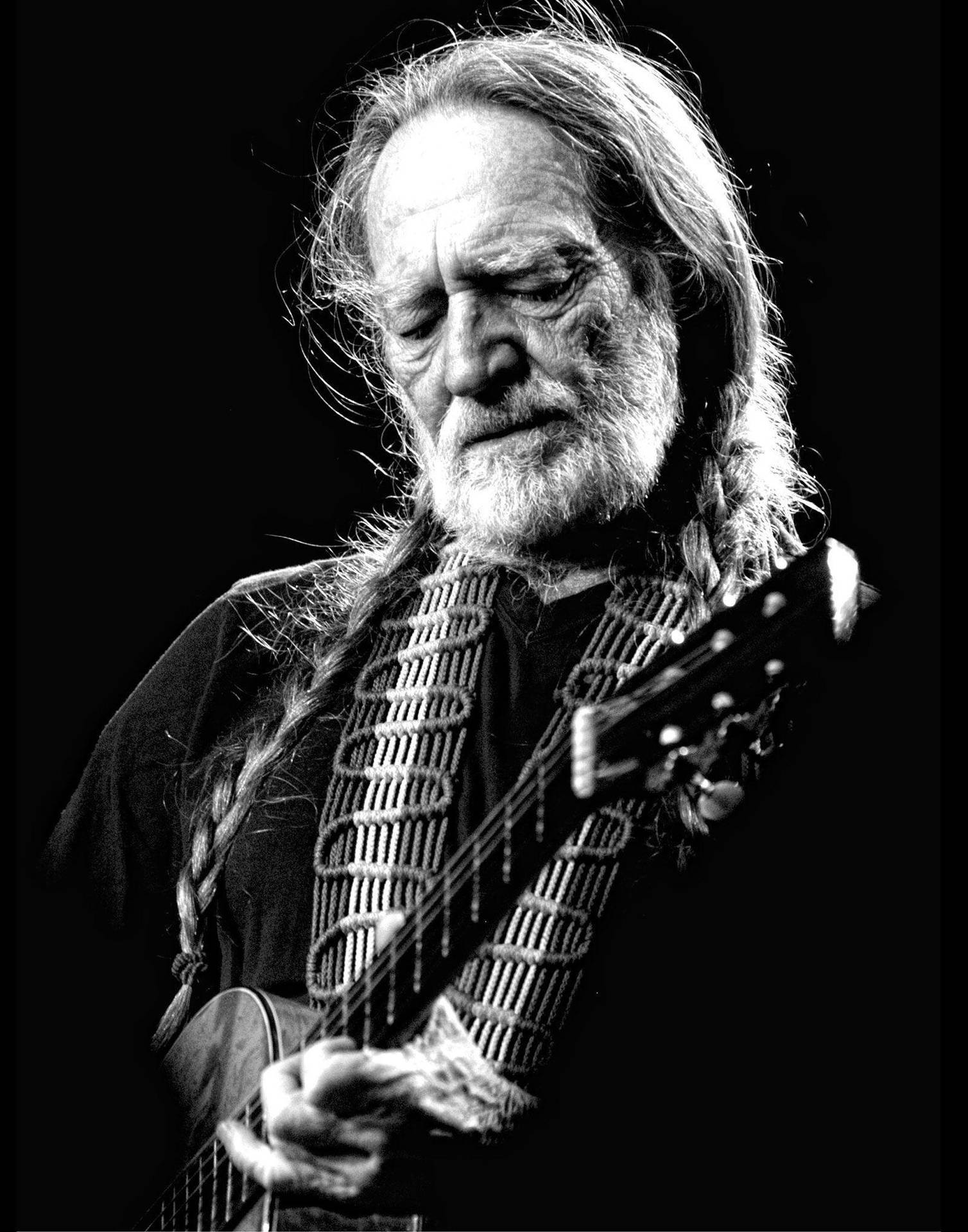 Iconic Country Music Legend Willie Nelson in Monochrome Wallpaper