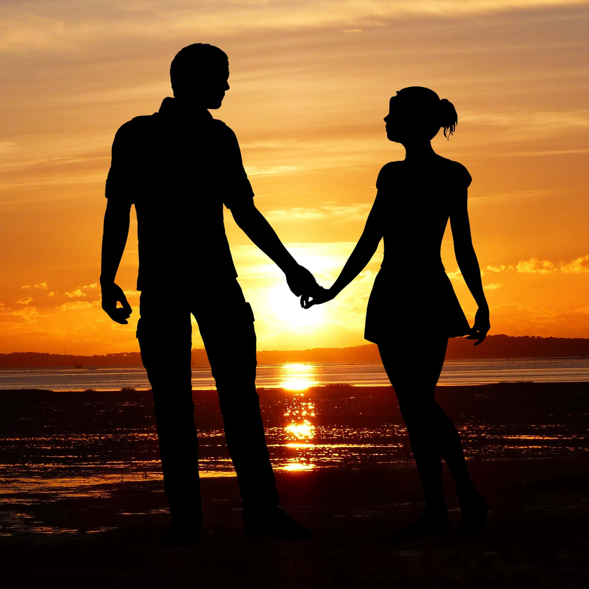 Couple At Beach Holding Hands Silhouette Wallpaper