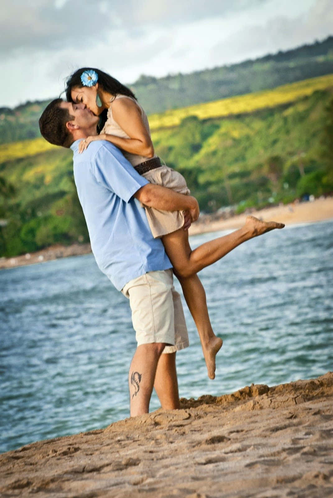 Couple At Beach With Forest Background Picture